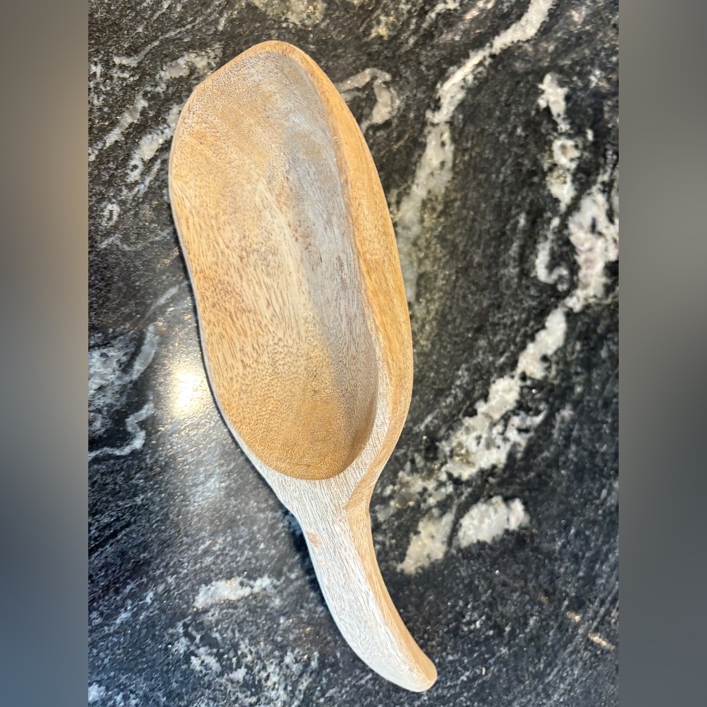 Vintage wooden farmer scoop.